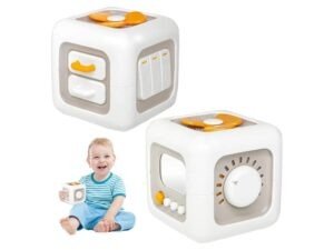 Bebé jugando con el Cubo Explorador didáctico interactivo para estimular la motricidad y la curiosidad.